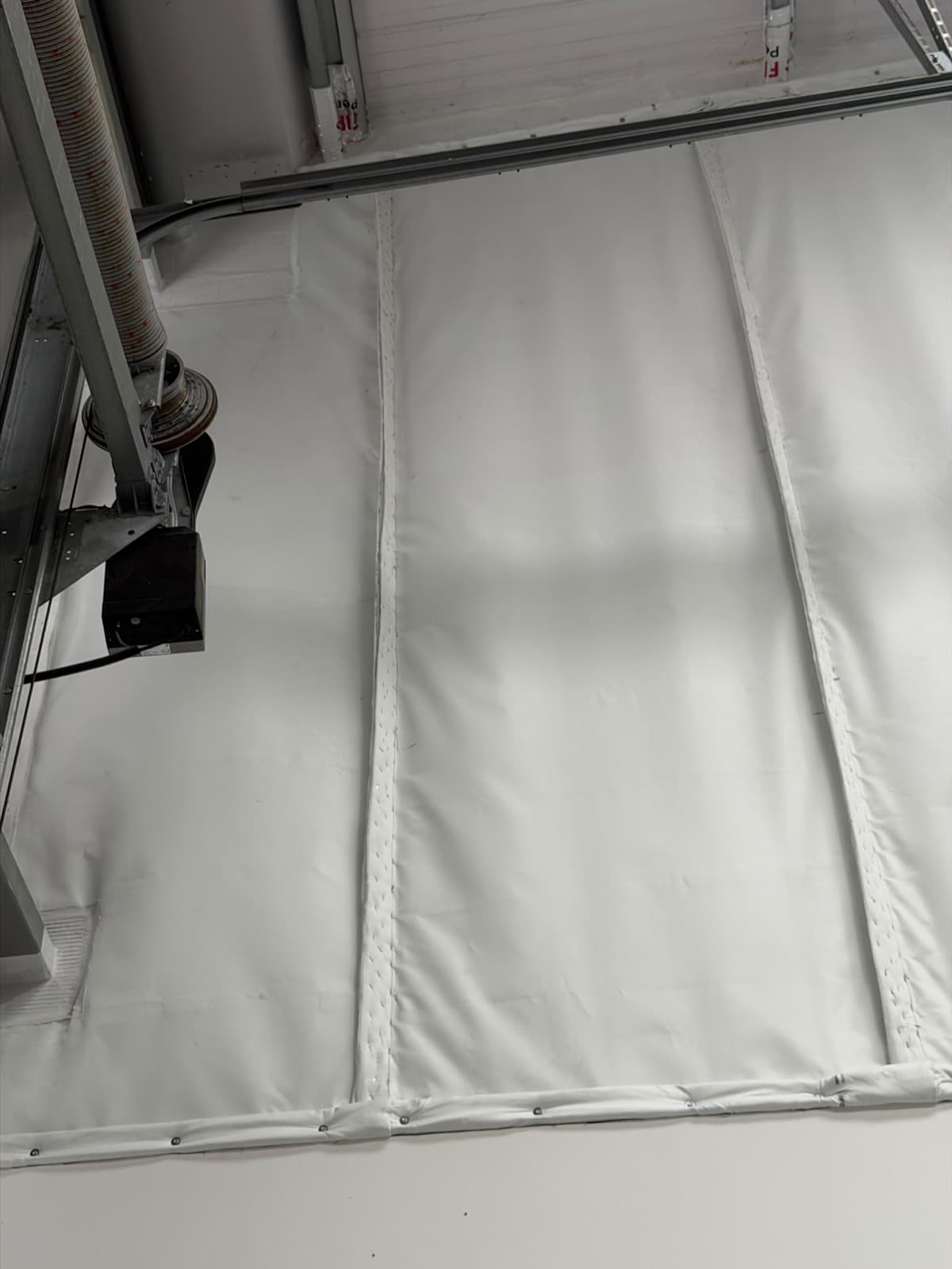 Butt joints between panels and the wrapped base along the office wall